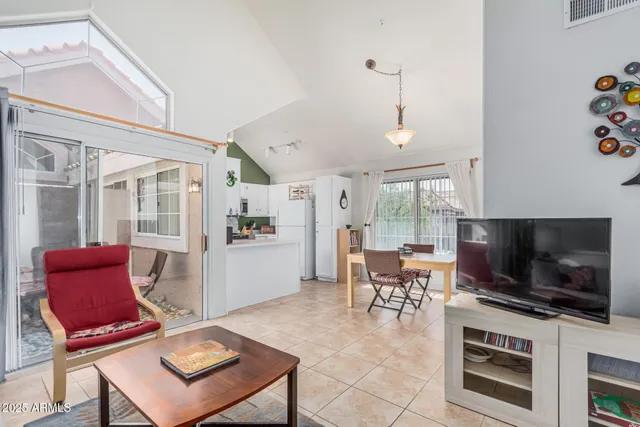 a workspace with furniture and a window