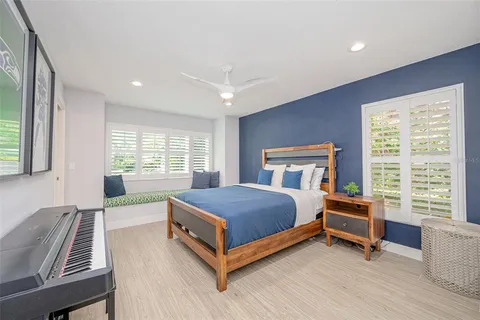 a bathroom with a granite countertop sink mirror and double
