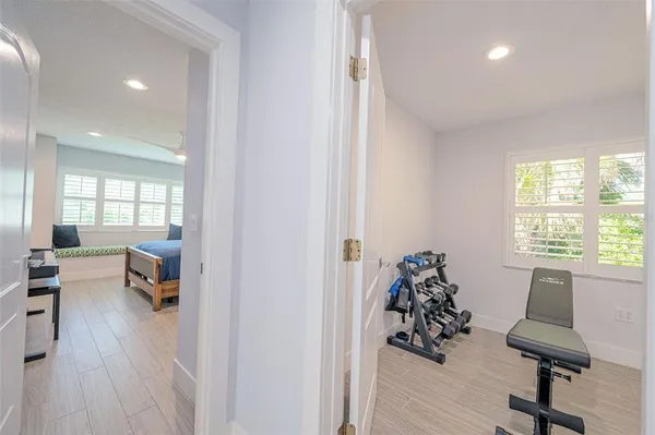 a view of a backyard with a swimming pool