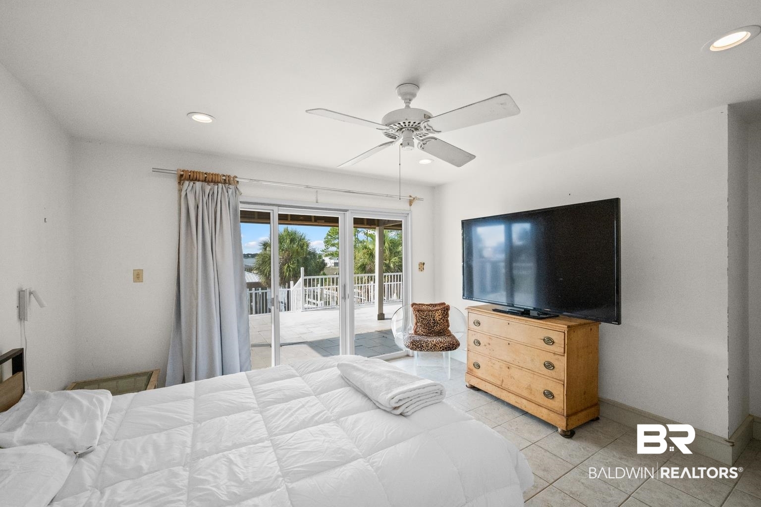 29255 Ono Boulevard Orange Beach, AL 36561 - Photo 29 of 43 Bedroom with access to exterior, recessed lighting, light tile patterned flooring, and a ceiling fan