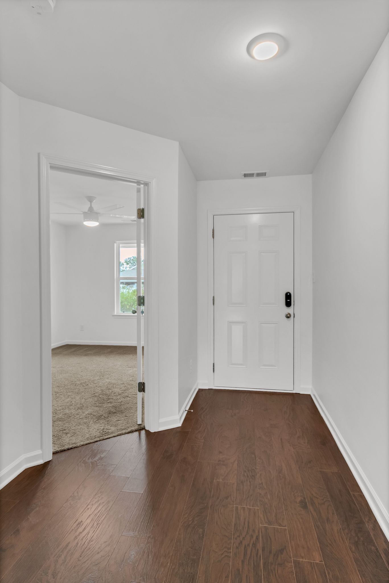 3734 Spahn Lane Murfreesboro, TN 37128 - Photo 22 of 25 an empty room with wooden floor and mirror