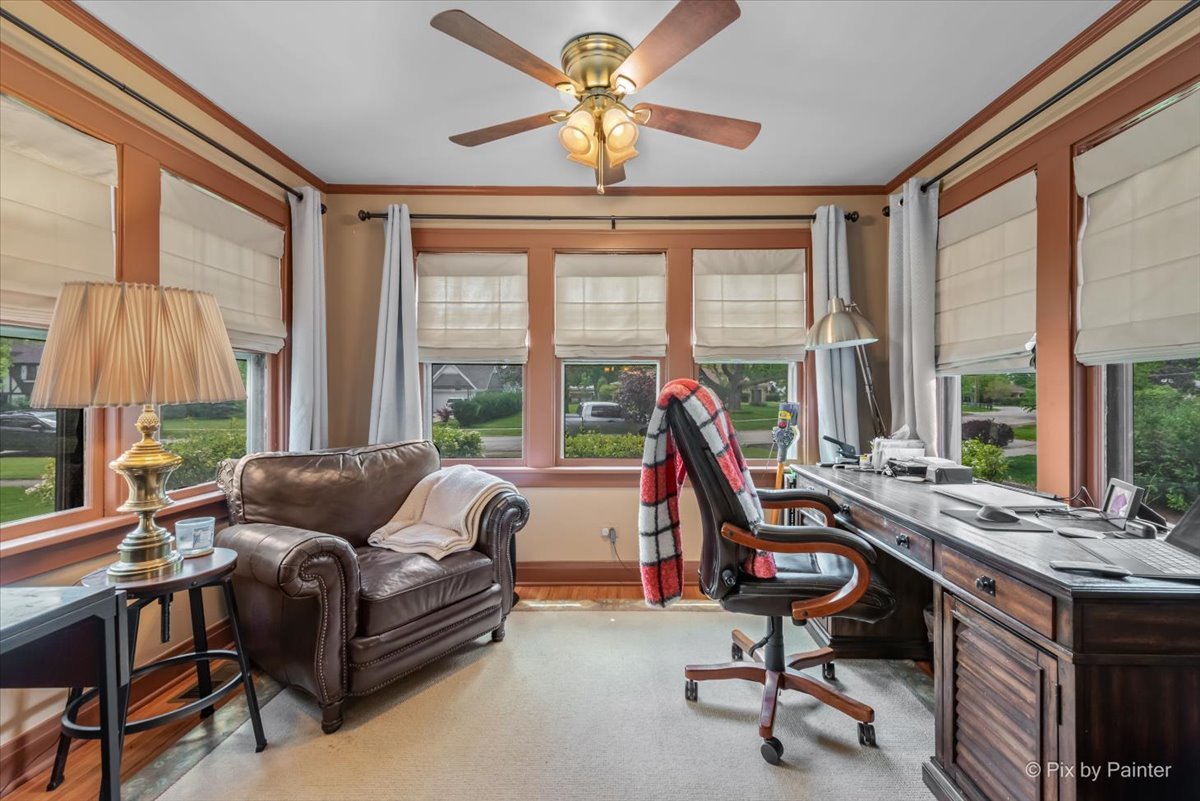 335 Arlington Road Itasca, IL 60143 - Photo 13 of 36 a living room with furniture and a large window