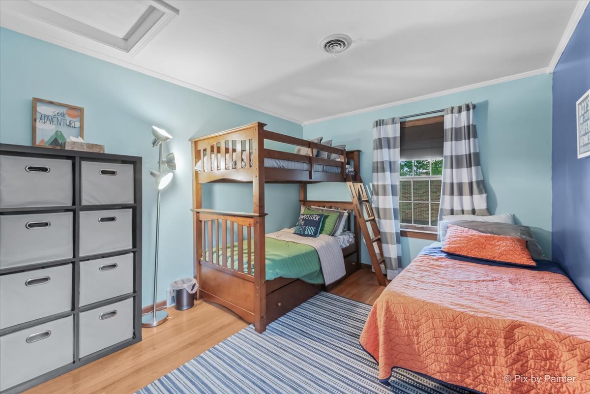 335 Arlington Road Itasca, IL 60143 - Photo 17 of 36 a bedroom with furniture and a window