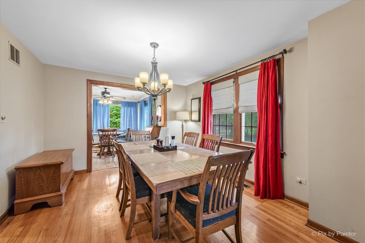 335 Arlington Road Itasca, IL 60143 - Photo 5 of 36 a view of a dining room with furniture window and wooden floor