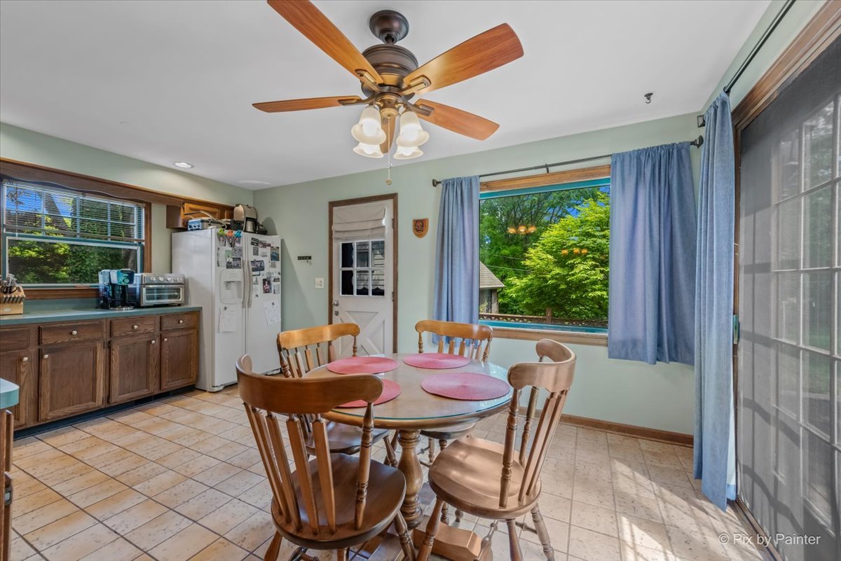 335 Arlington Road Itasca, IL 60143 - Photo 7 of 36 a view of a dining room with furniture window and outside view
