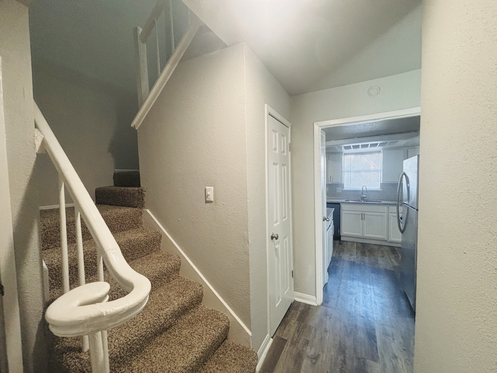 6200 West Tidwell Road, Unit 1109 Houston, TX 77092 - Photo 11 of 20 a view of entryway and hall with wooden floor