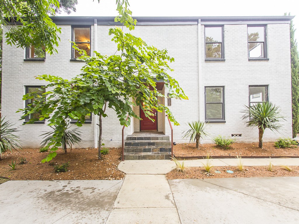 a white house with a outdoor space
