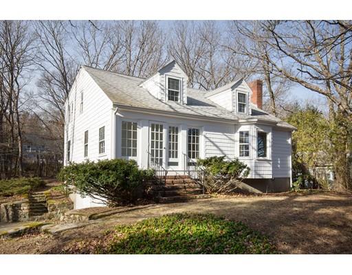 338 Conant Road Weston, MA 02493 - Photo 1 of 11 a front view of a house with a yard