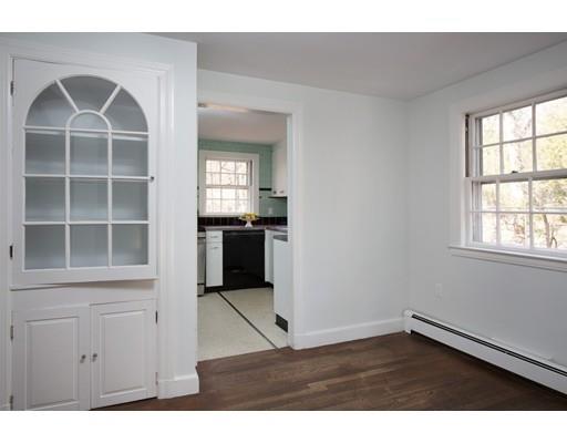 338 Conant Road Weston, MA 02493 - Photo 5 of 11 a view of an empty room with a window