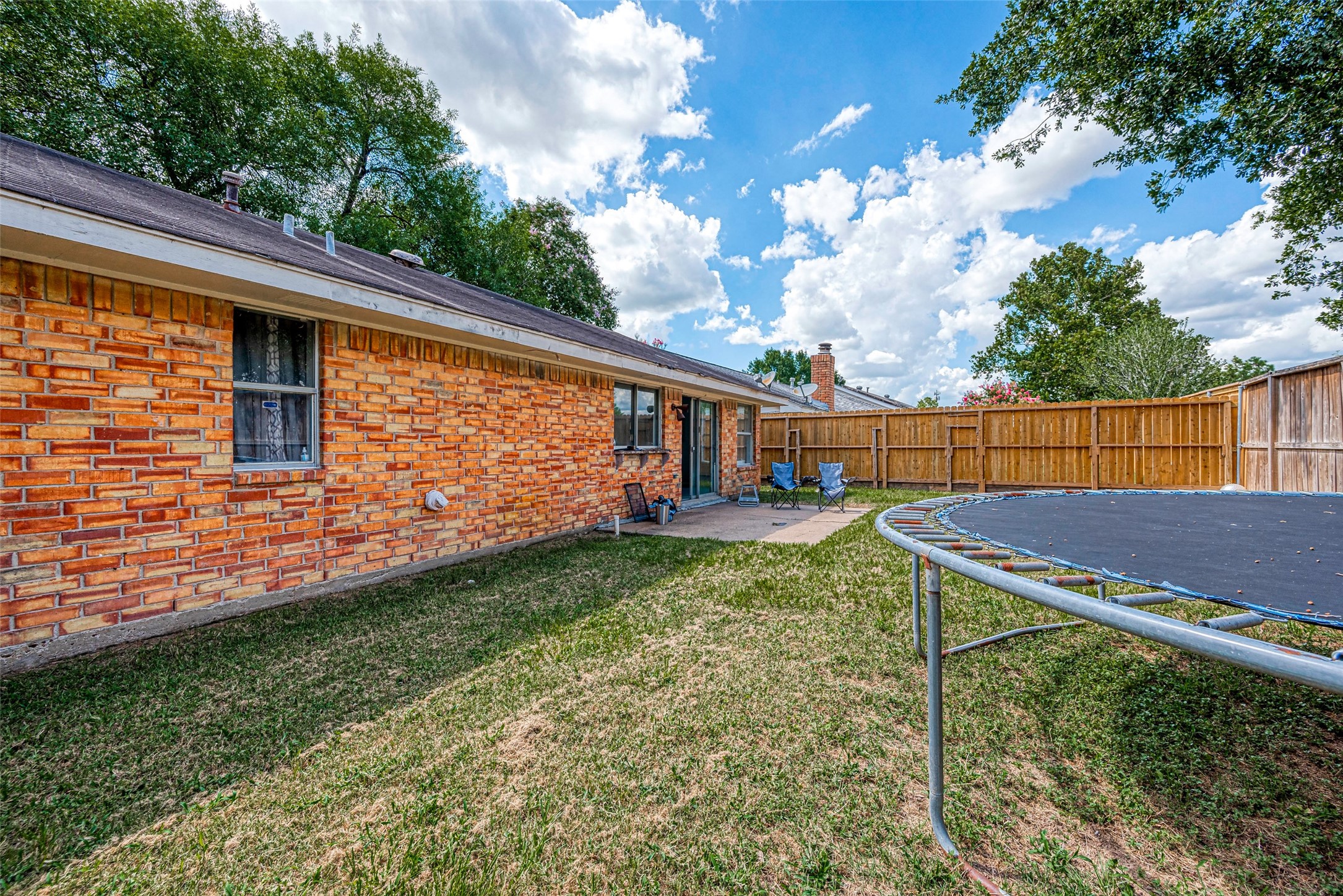 2226 Gray Hawk Lane Katy, TX 77449 - Photo 16 of 16 a backyard of a house with lots of green space