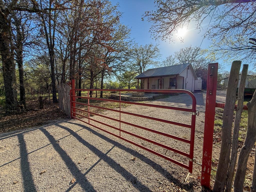 4909 Barton Chapel Road Jacksboro, TX 76458 - Photo 8 of 37 a view of a house with a yard
