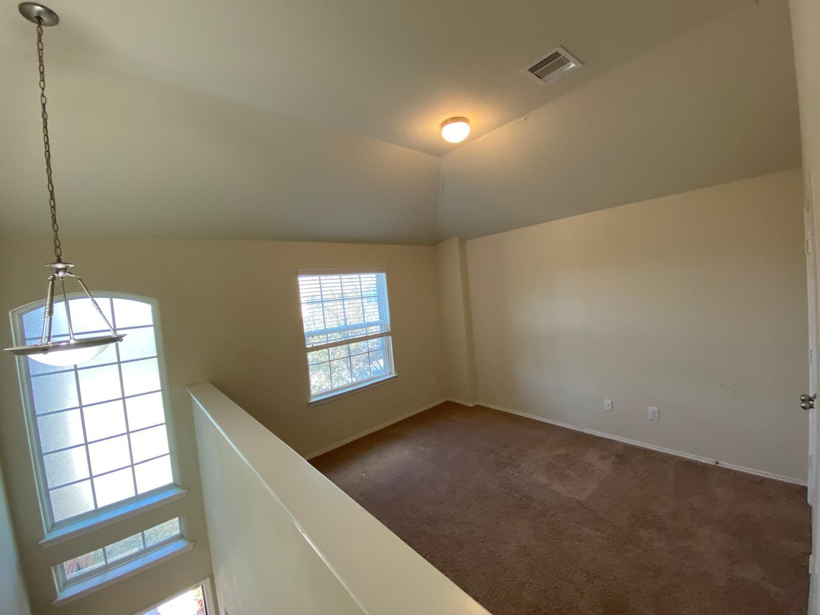 1515 Daffodil Road Missouri City, TX 77489 - Photo 18 of 20 a view of an empty room and window