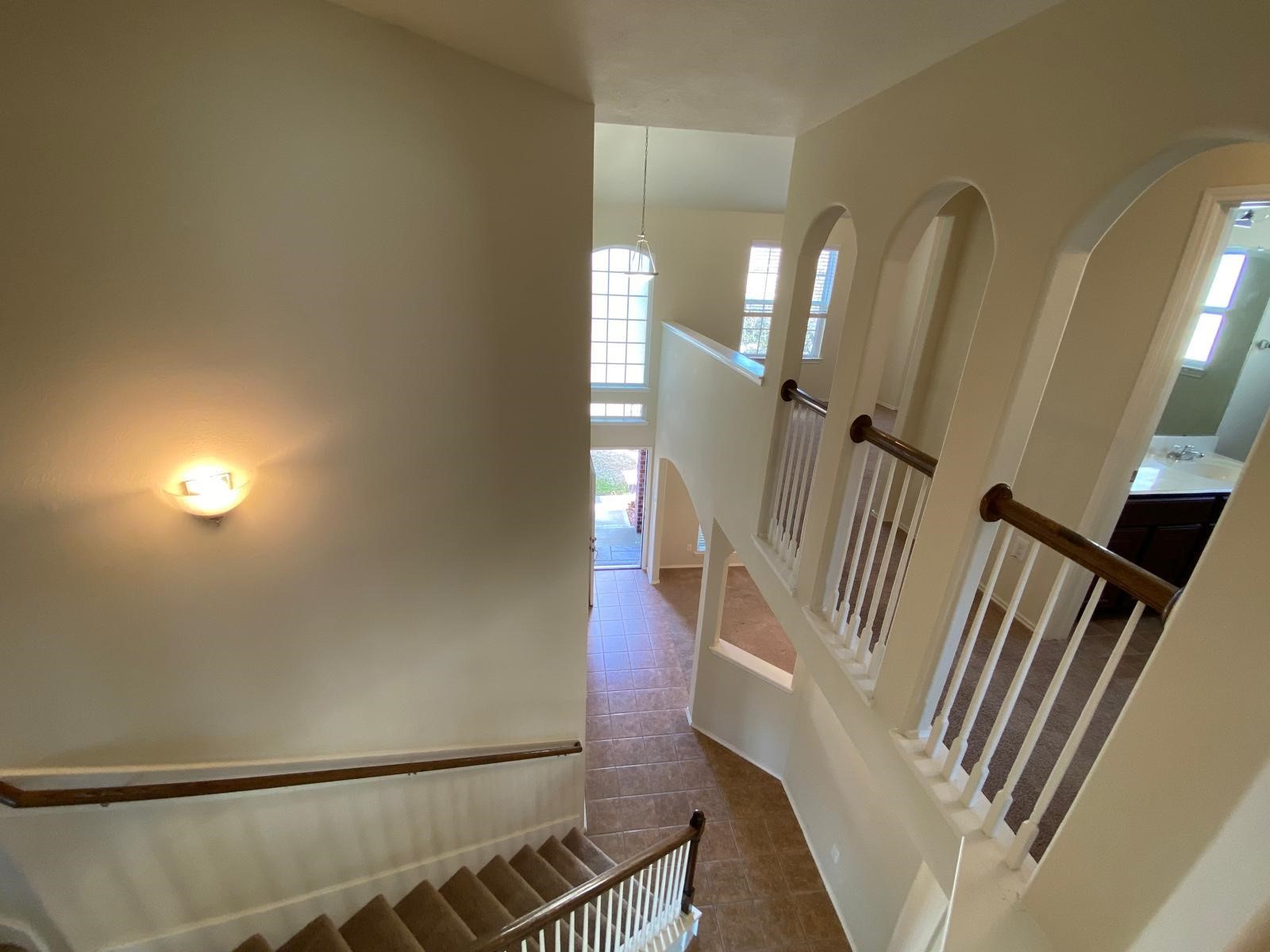 1515 Daffodil Road Missouri City, TX 77489 - Photo 19 of 20 a view of an entryway with wooden floor