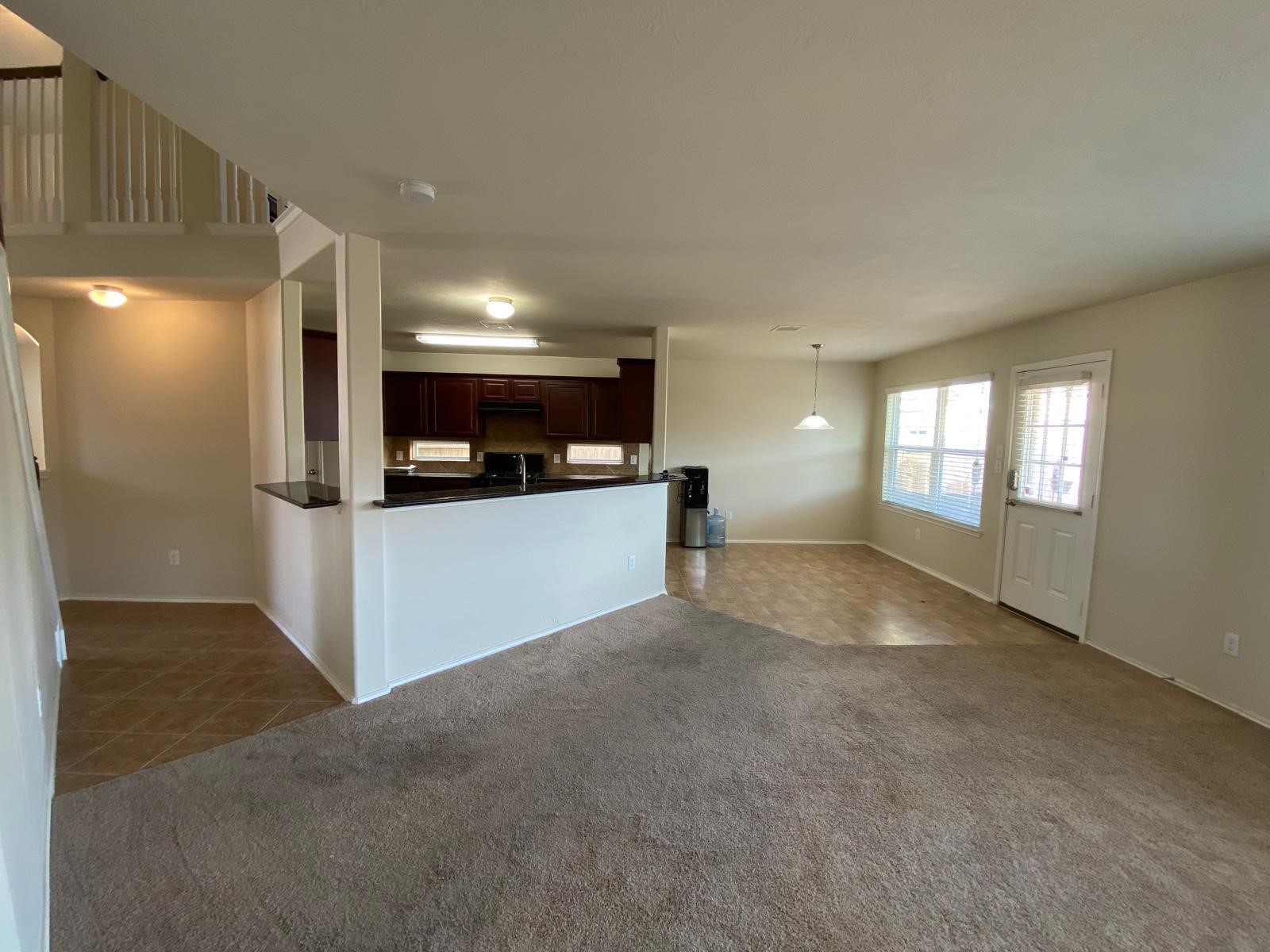 1515 Daffodil Road Missouri City, TX 77489 - Photo 9 of 20 a view of a kitchen and a window