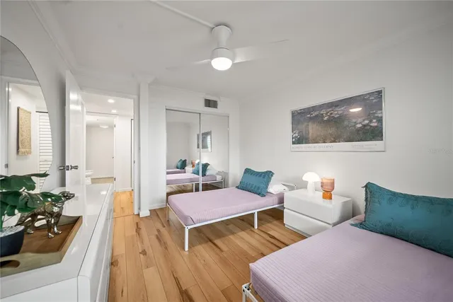 a view of a patio with table and chairs and potted plants