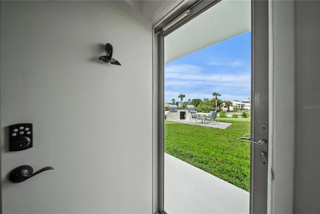 a view of a chairs and table in the terrace