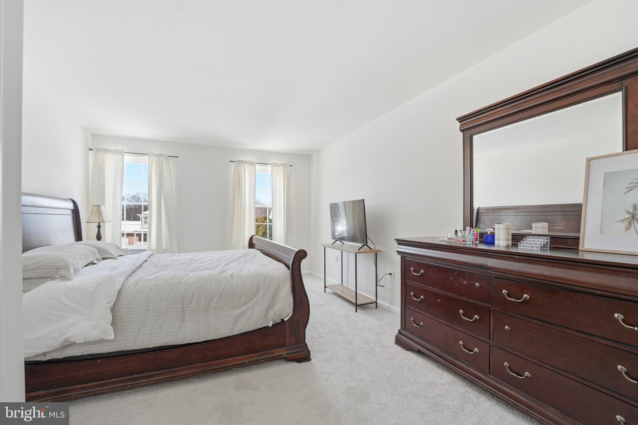 13709 Palm Road Woodbridge, VA 22193 - Photo 15 of 34 Bright and airy bedroom with serene views.