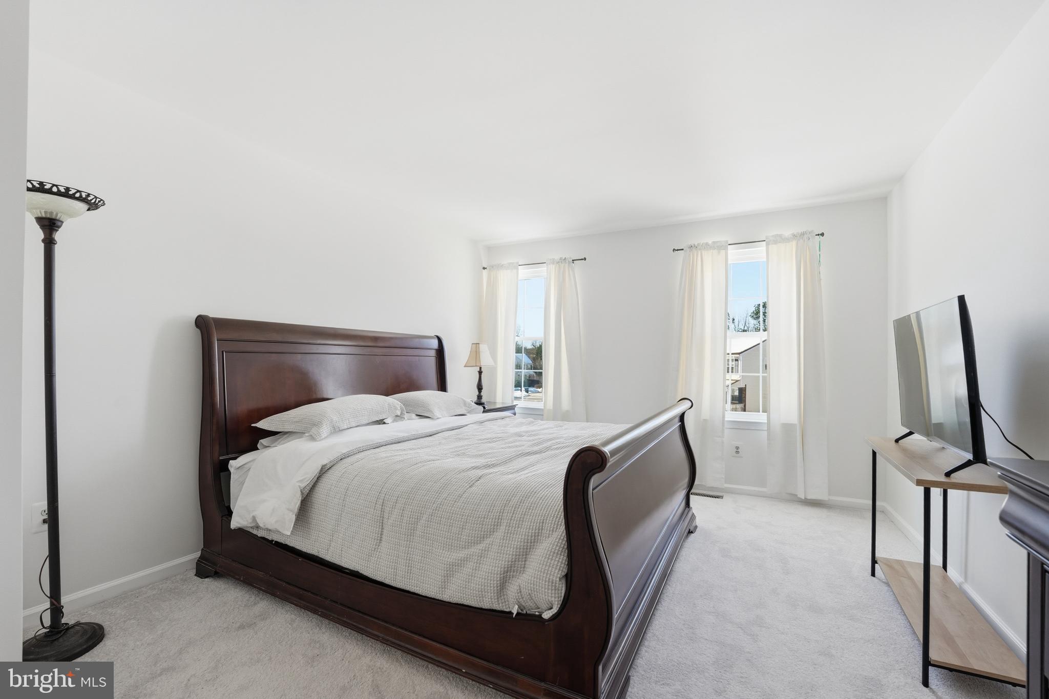 13709 Palm Road Woodbridge, VA 22193 - Photo 16 of 34 Bright and airy bedroom with elegant charm.