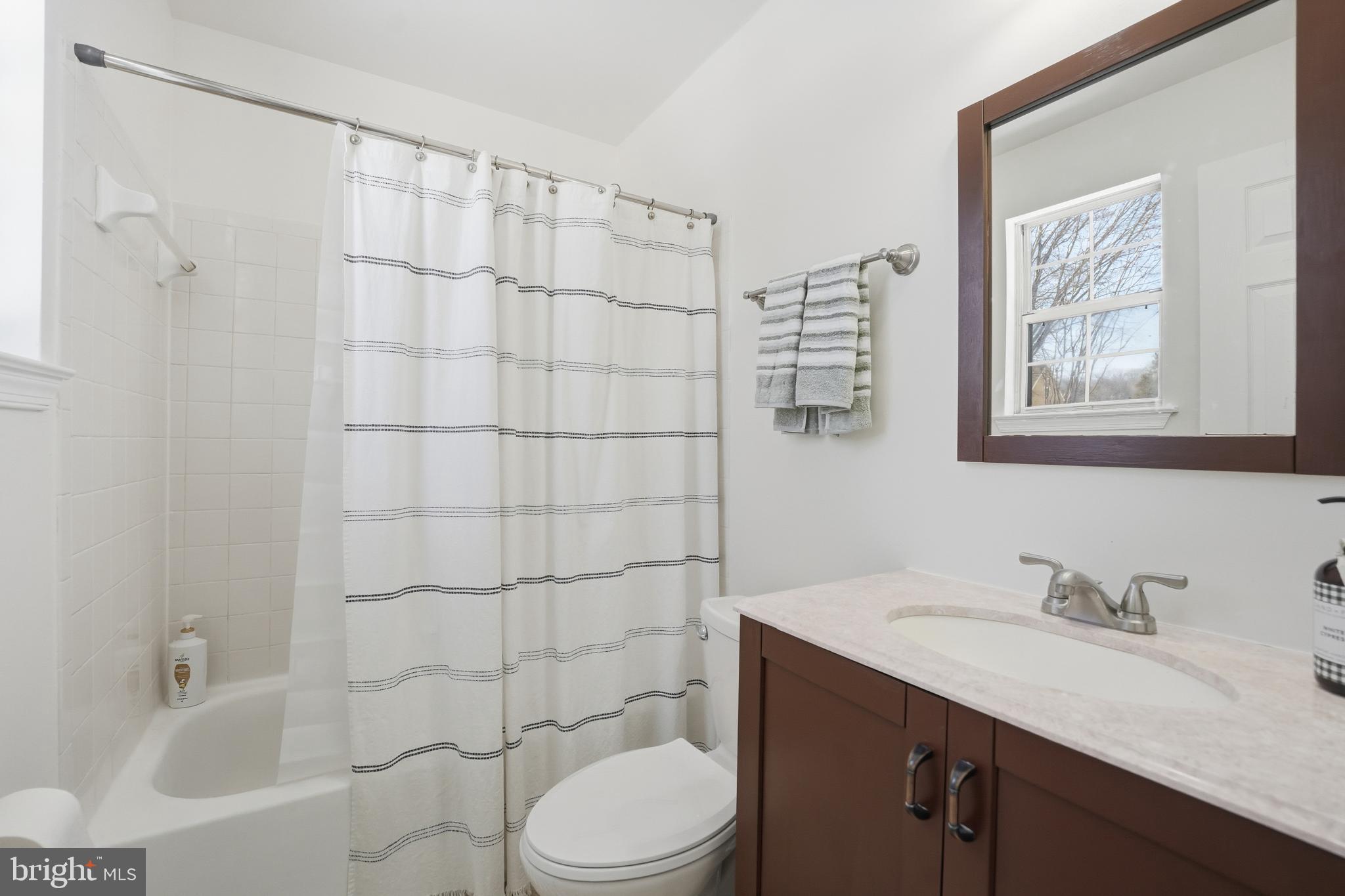 13709 Palm Road Woodbridge, VA 22193 - Photo 17 of 34 Bright and airy modern bathroom retreat.