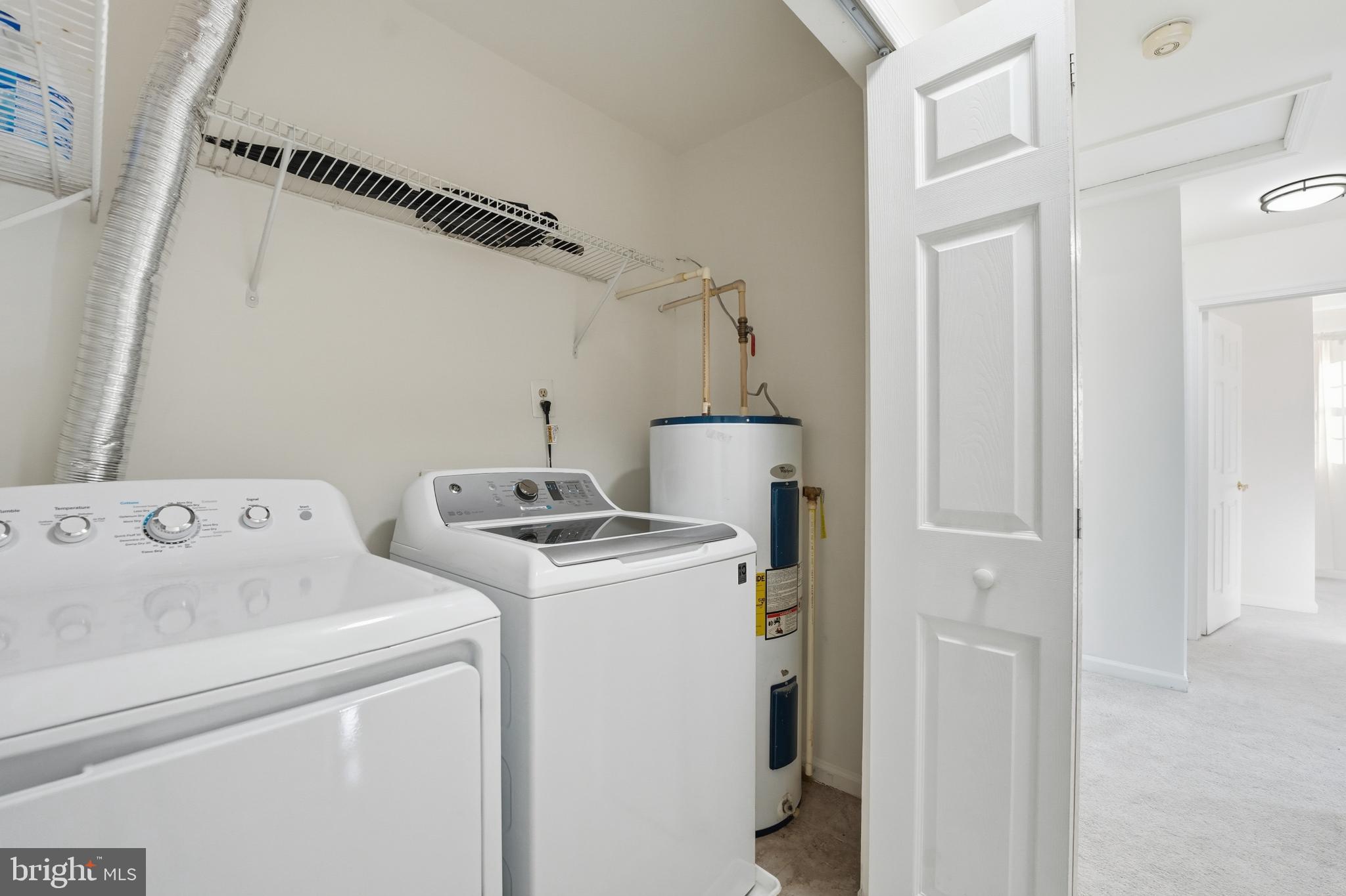 13709 Palm Road Woodbridge, VA 22193 - Photo 26 of 34 Bright and functional laundry space.