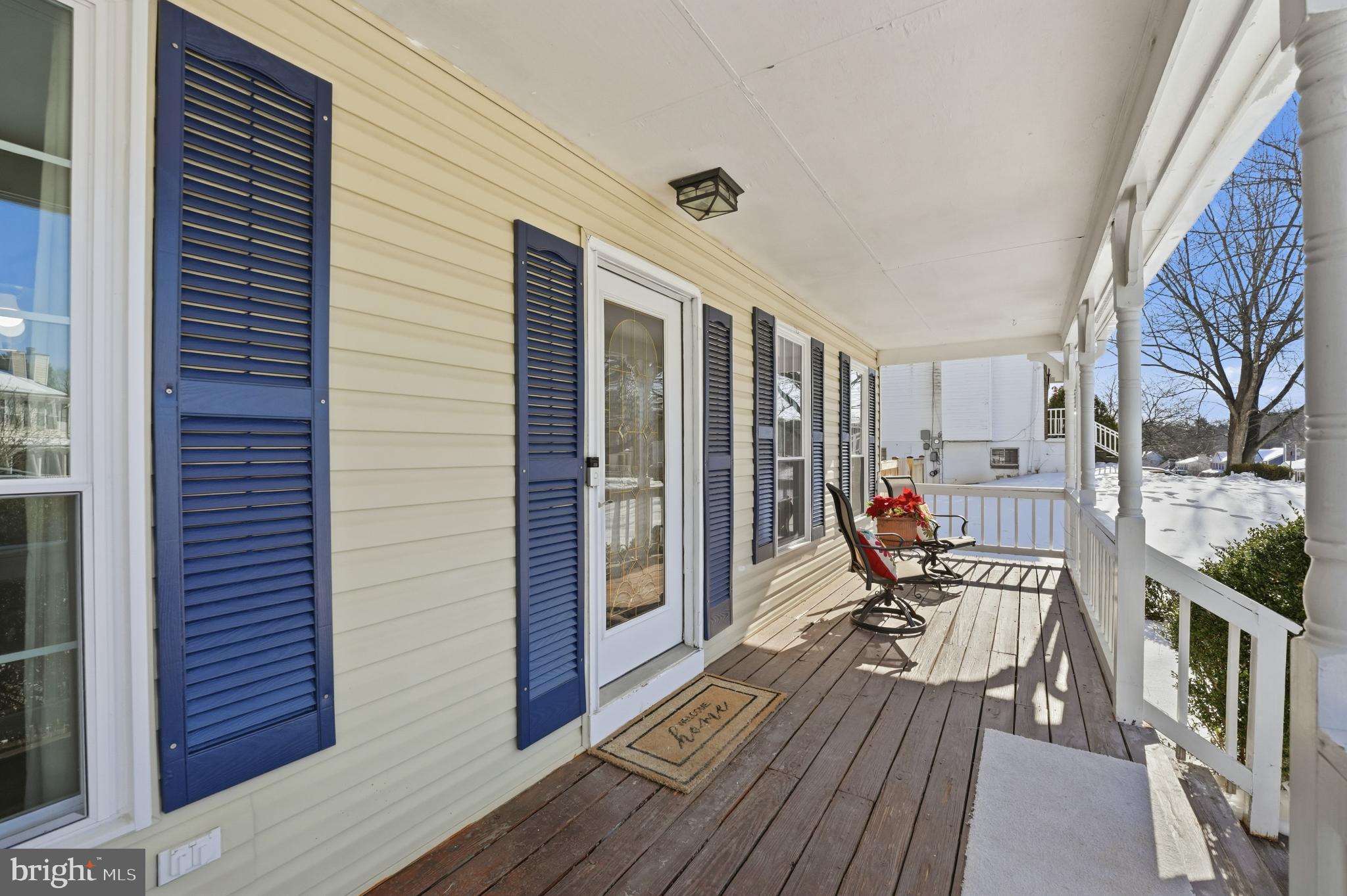 13709 Palm Road Woodbridge, VA 22193 - Photo 29 of 34 Charming porch with inviting blue shutters.
