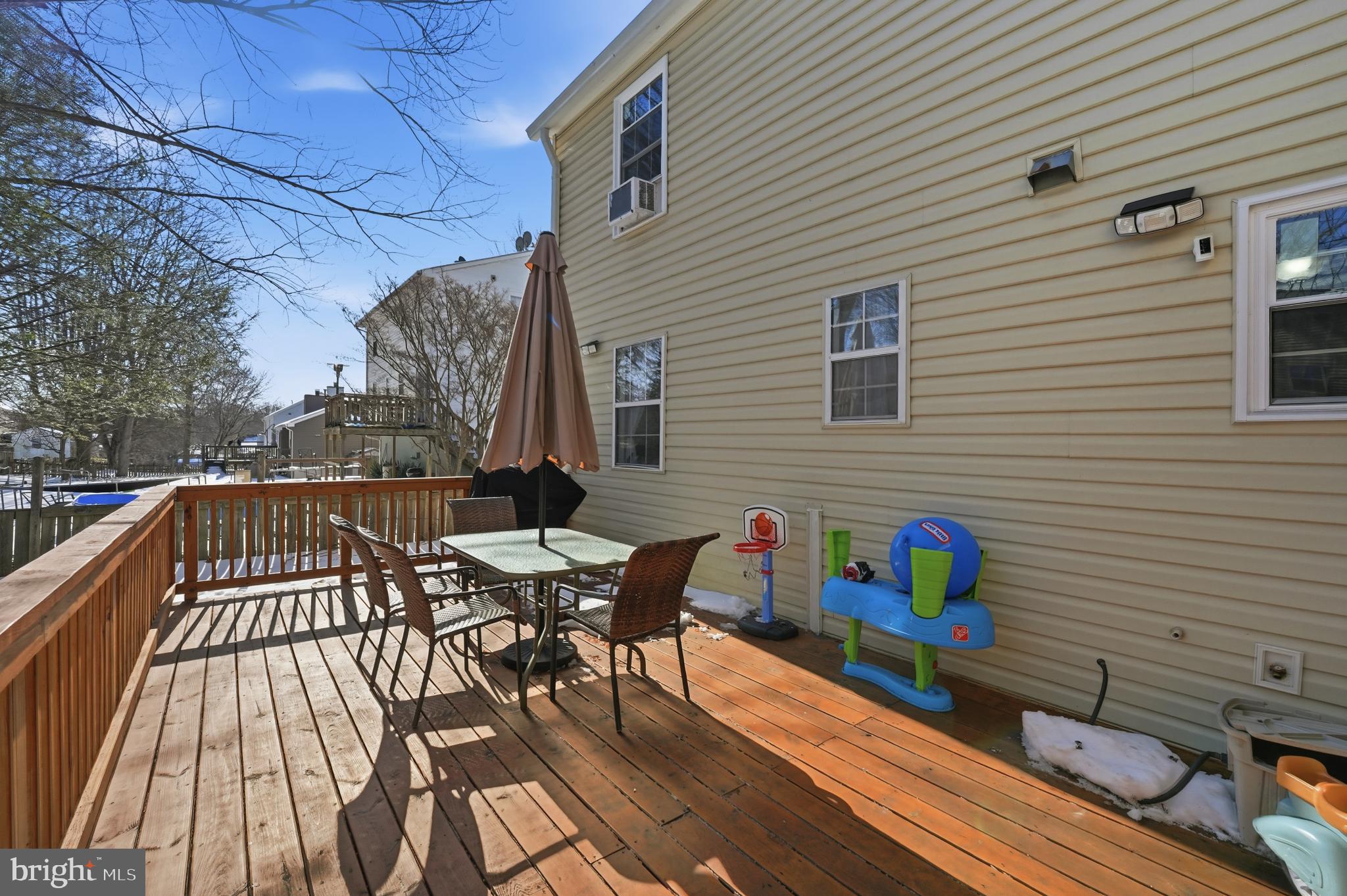 13709 Palm Road Woodbridge, VA 22193 - Photo 31 of 34 Sunny deck perfect for outdoor gatherings.