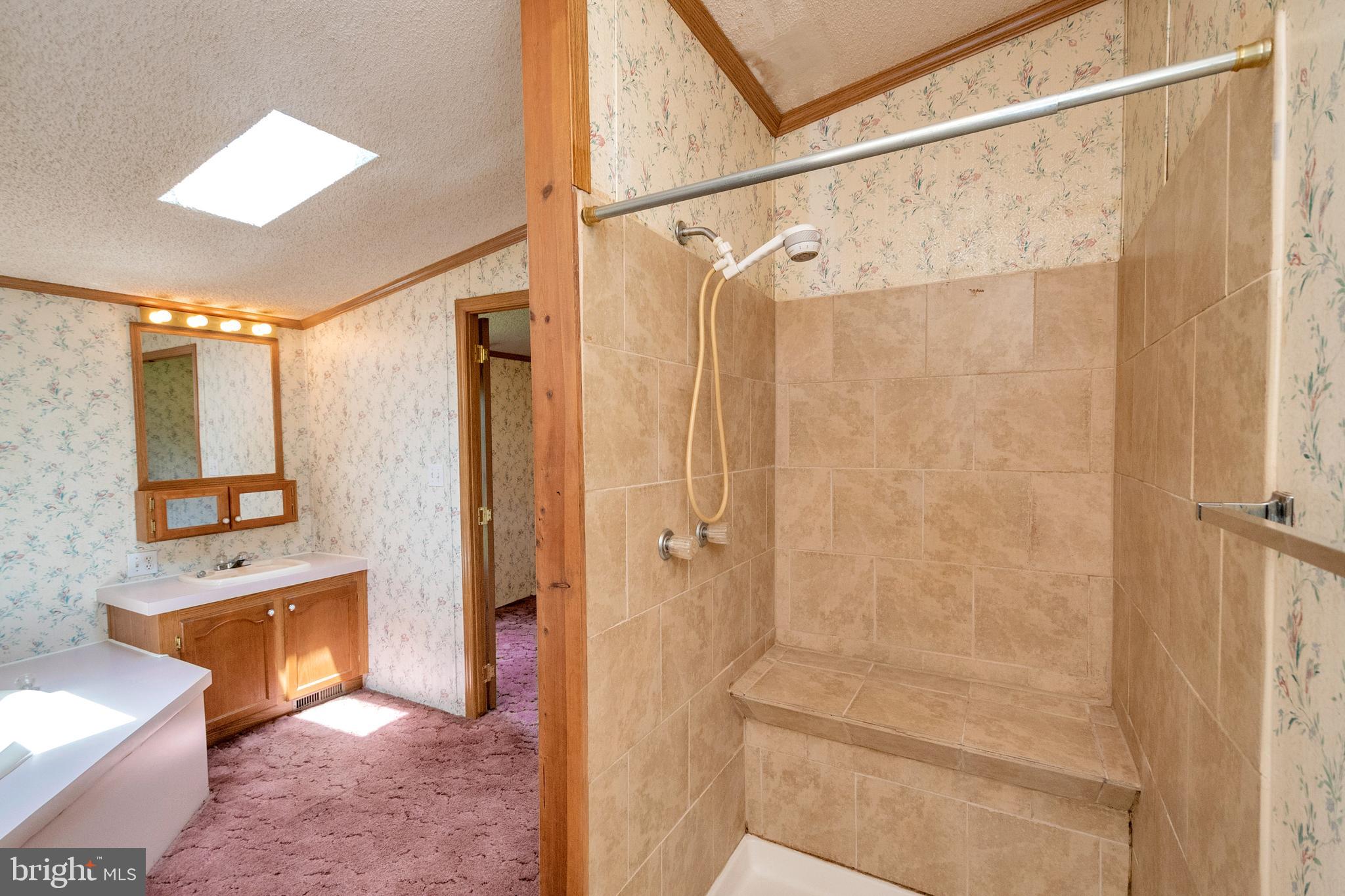 34076 Ridge View Drive Locust Grove, VA 22508 - Photo 17 of 27 Stall shower with bench for seating