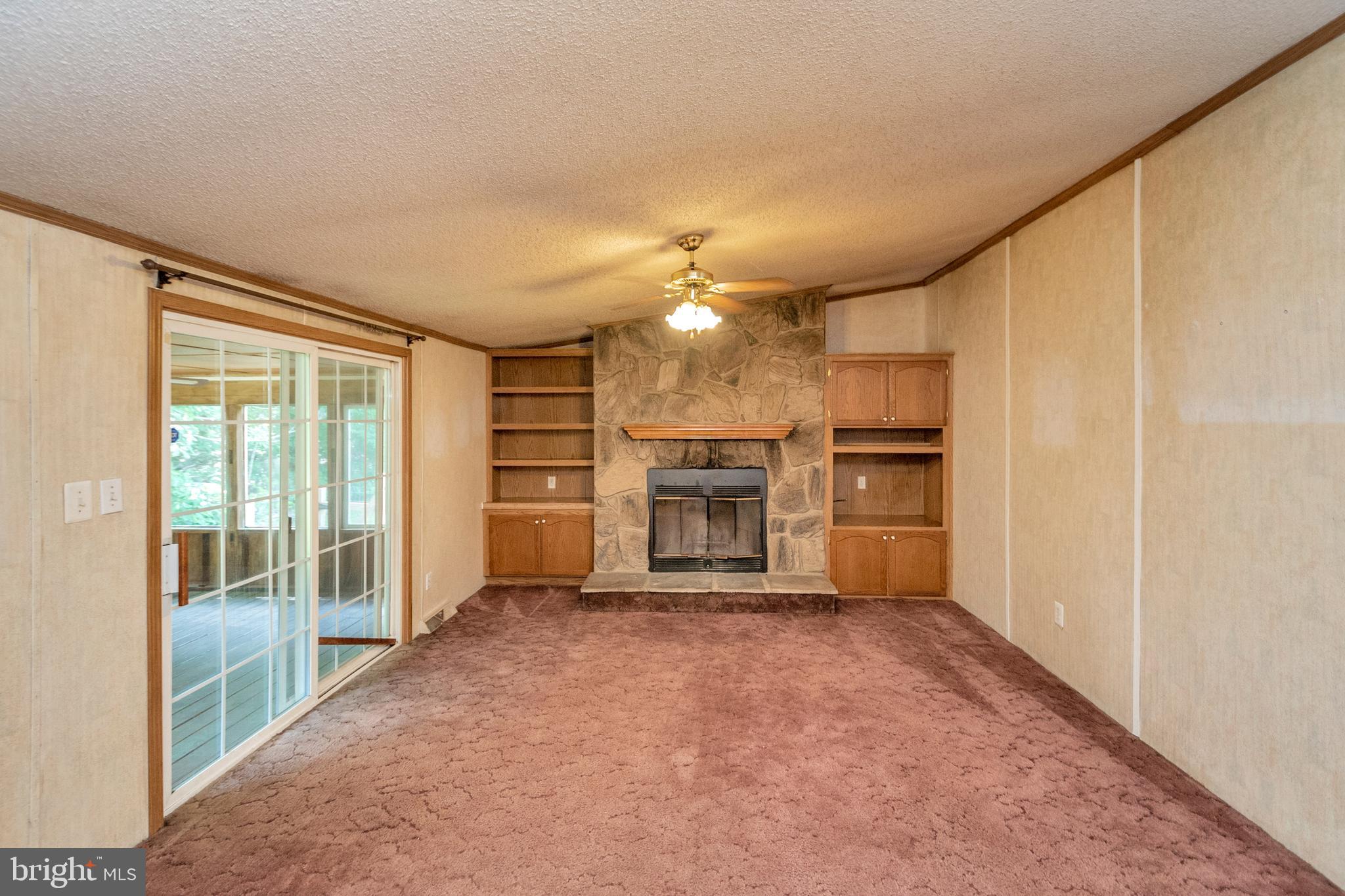 34076 Ridge View Drive Locust Grove, VA 22508 - Photo 10 of 27 Family room with fireplace and built ins