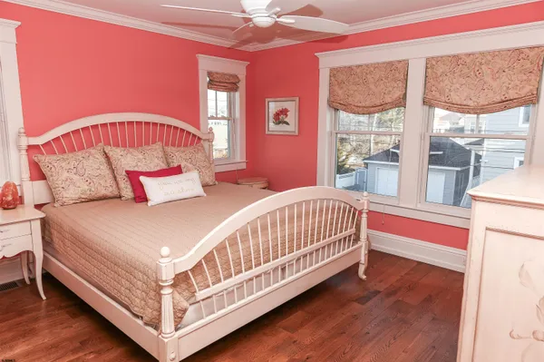 a bedroom with a bed and a cabinets