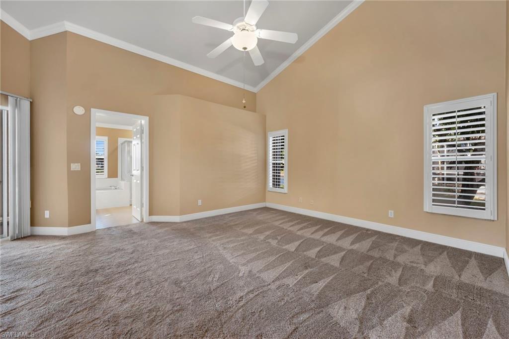 5101 Mabry Drive Naples, FL 34112 - Photo 8 of 18 a view of an empty room with a window