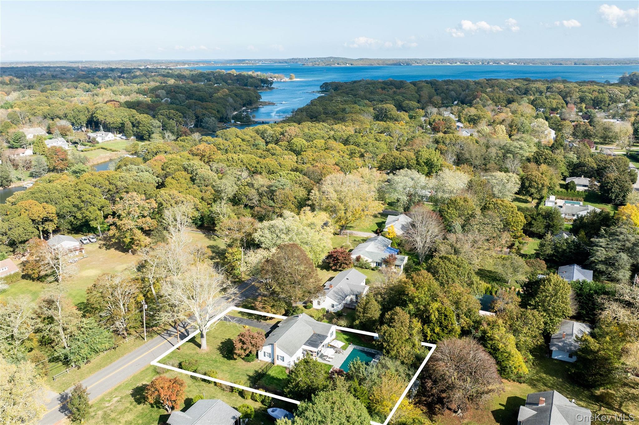 920 Pine Neck Road Southold, NY 11971 - Photo 26 of 28 an aerial view of residential houses with outdoor space