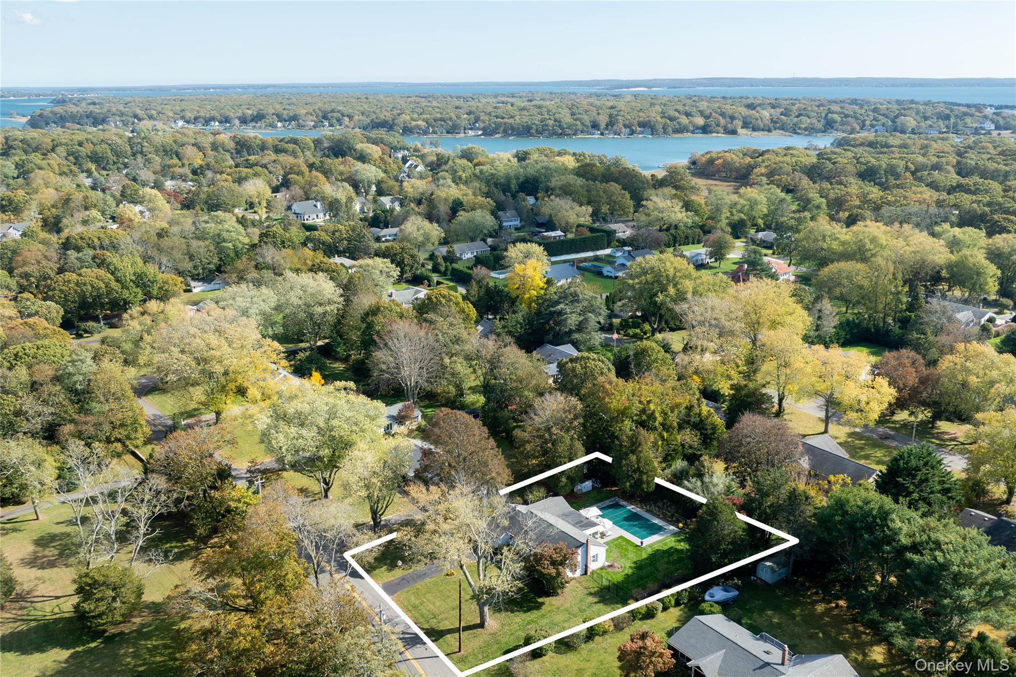 920 Pine Neck Road Southold, NY 11971 - Photo 28 of 28 an aerial view of residential houses with outdoor space