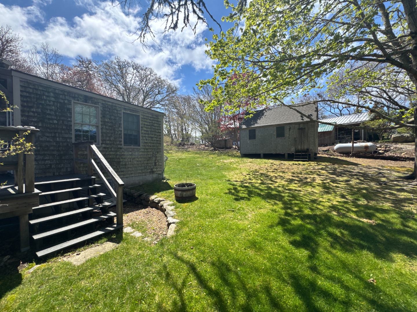 10 Abel's Neck Road Chilmark, MA 02535 - Photo 20 of 20 a front view of a house with a yard