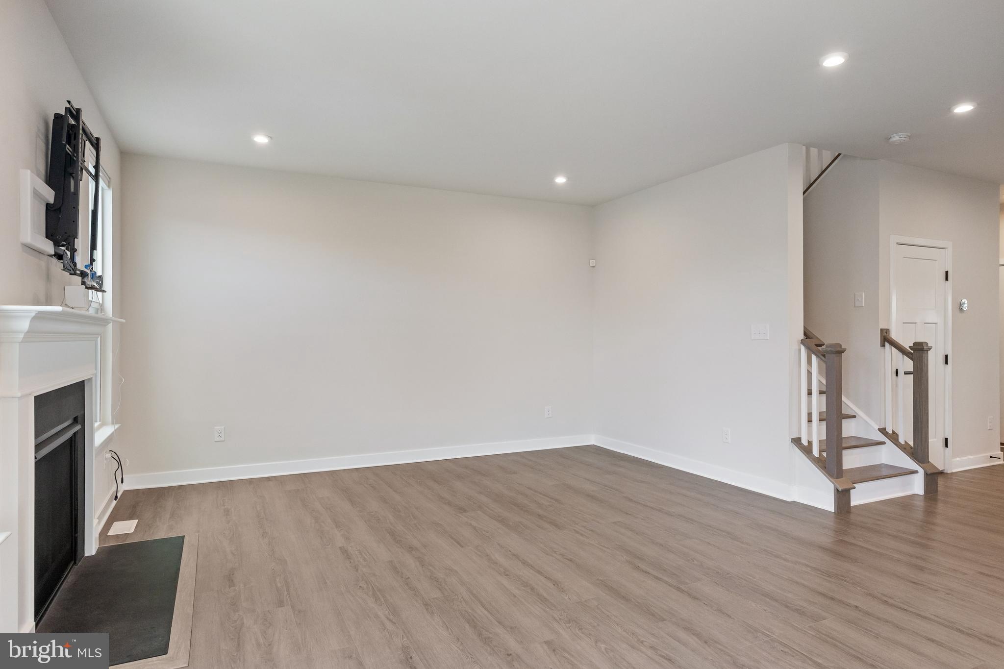 2 Rosemary Way Mount Laurel, NJ 08054 - Photo 11 of 28 a view of a room with wooden floor and a fireplace