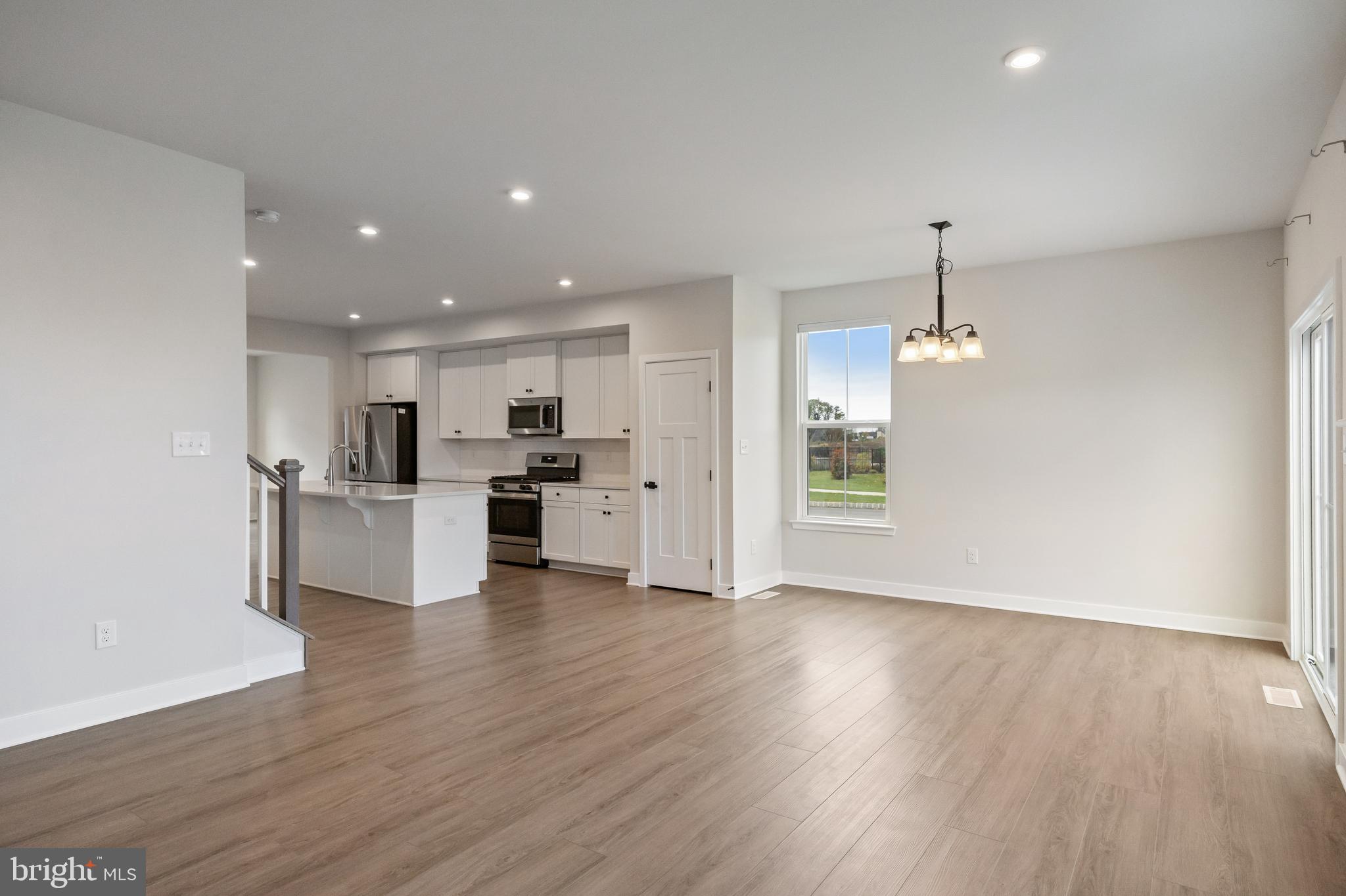 2 Rosemary Way Mount Laurel, NJ 08054 - Photo 12 of 28 a view of kitchen with refrigerator microwave and wooden floor