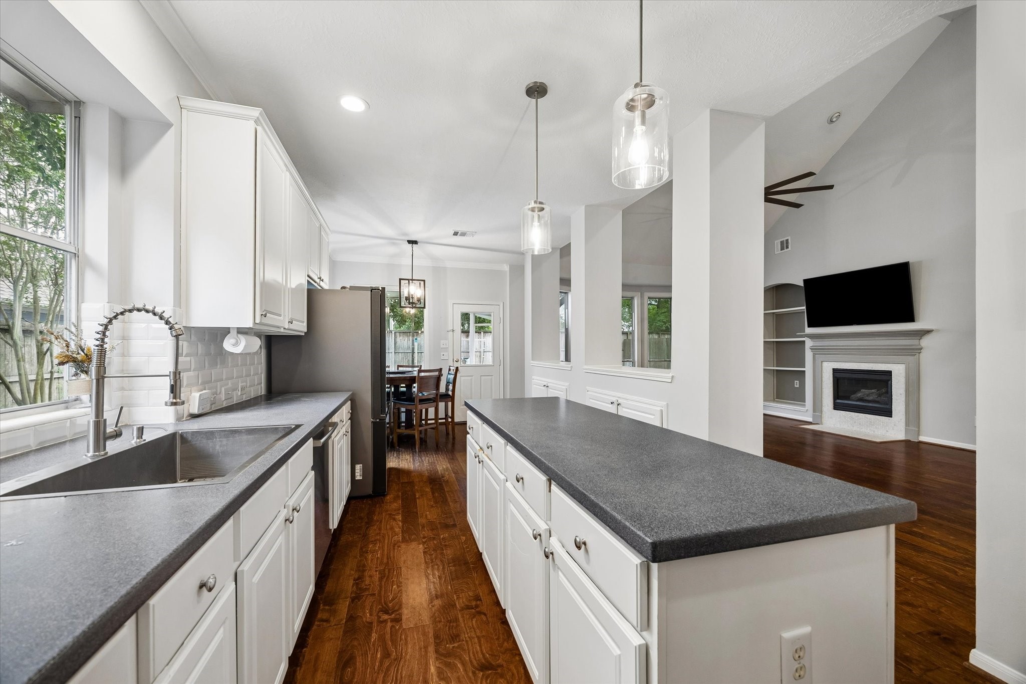 8123 Clarion Way Houston, TX 77040 - Photo 15 of 33 a kitchen with a stove and a sink