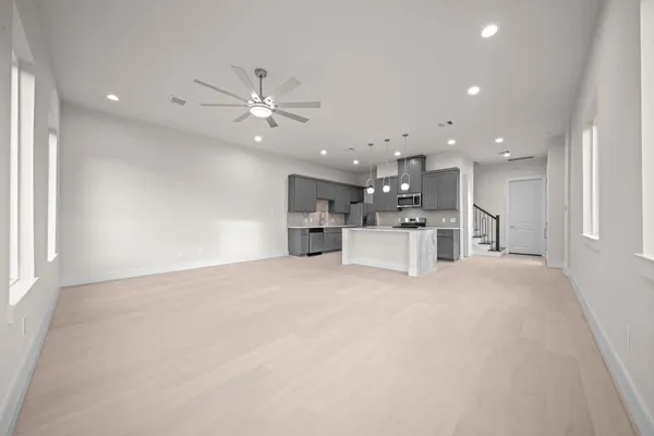 a view of a kitchen with a sink and a microwave