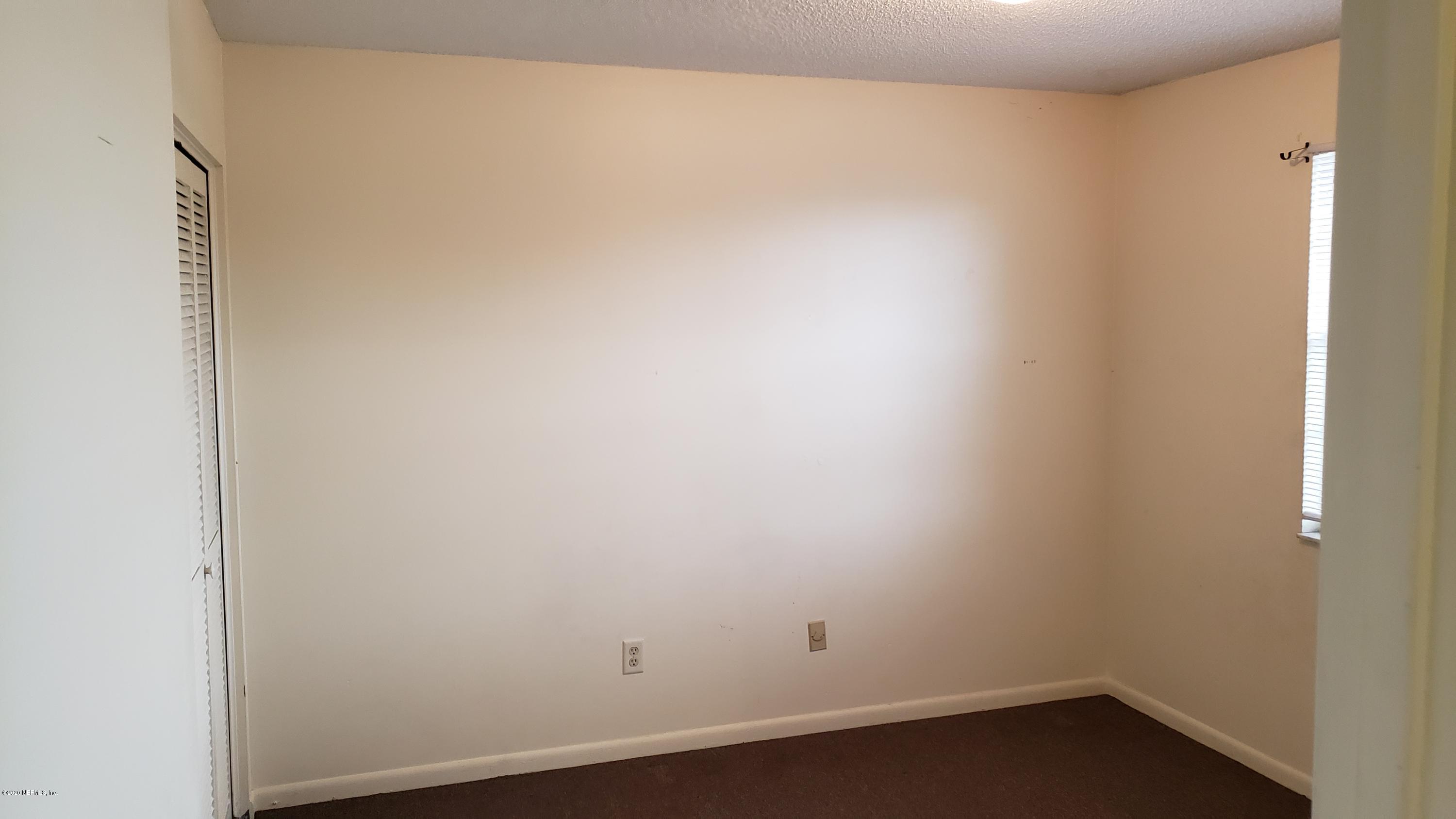 7208 Parker School Road, Unit 7 Jacksonville, FL 32211 - Photo 11 of 15 close up of a white marble wall