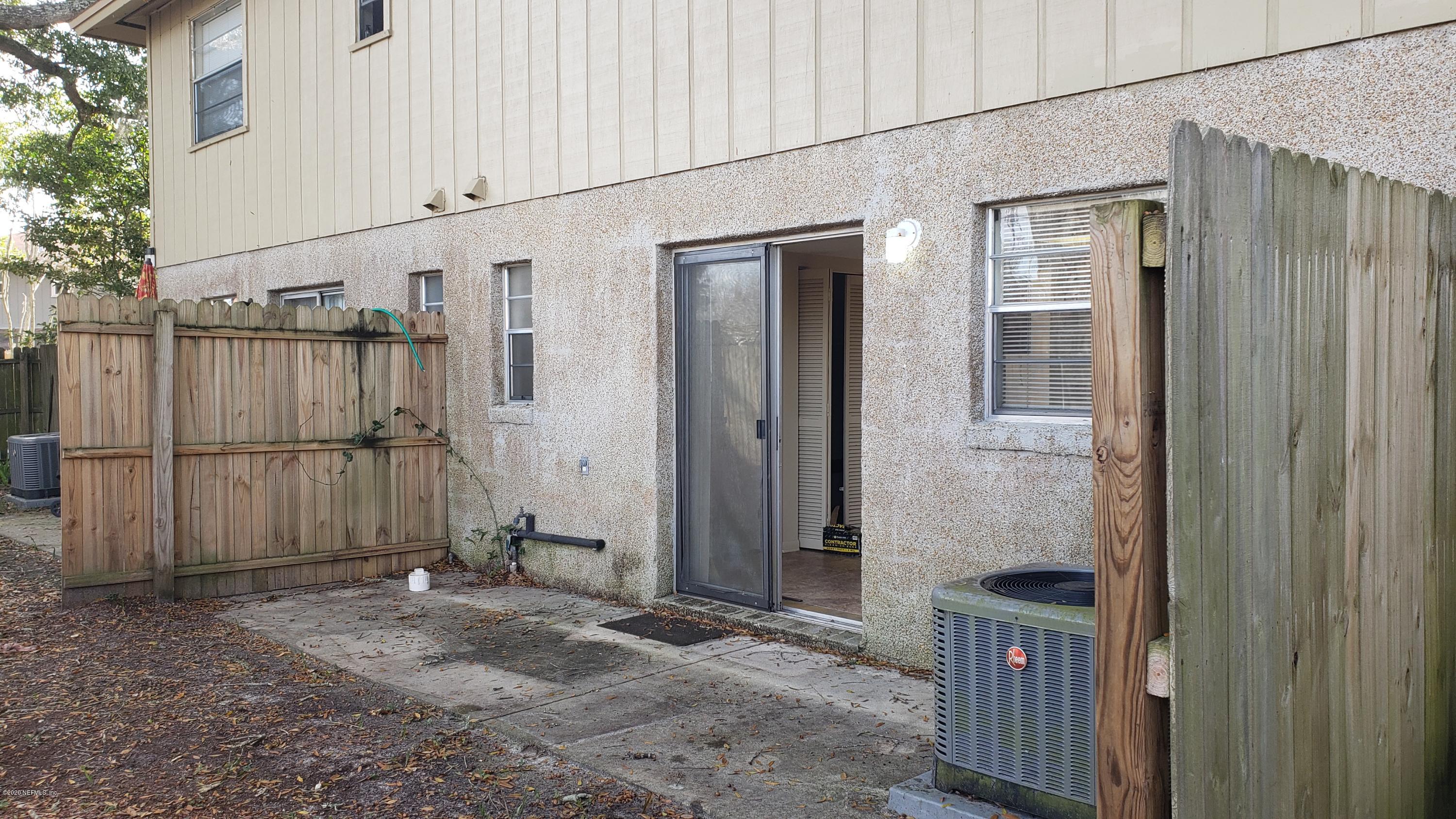 7208 Parker School Road, Unit 7 Jacksonville, FL 32211 - Photo 4 of 15 an entrance view of a house