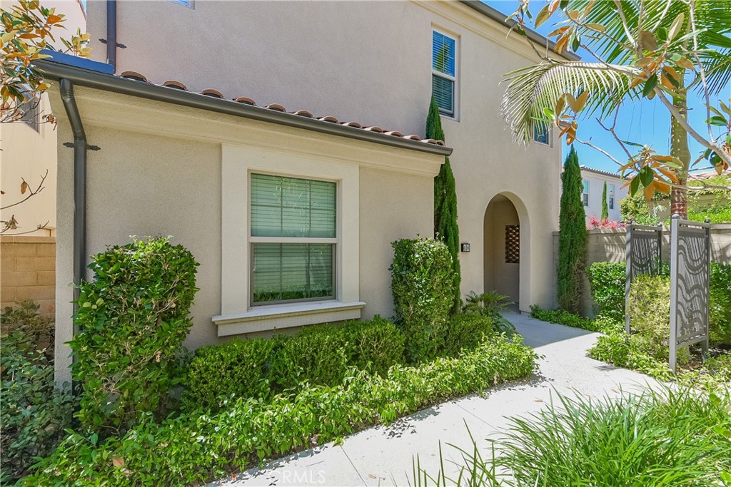 108 Copeland Irvine, CA 92618 - Photo 1 of 1 a front view of a house with garden