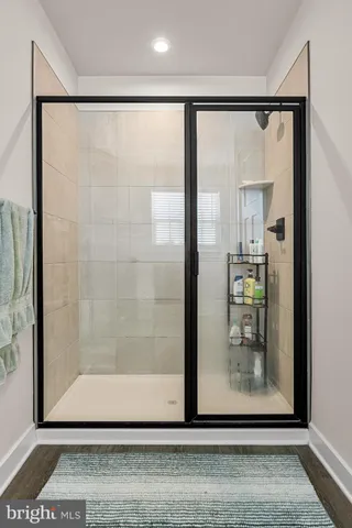 a view of a bathroom with a glass door