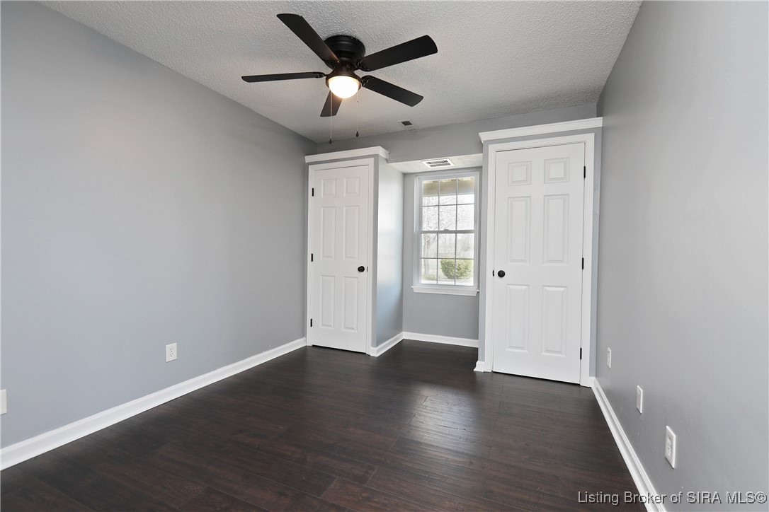 10 West County Line Road Scottsburg, IN 47177 - Photo 18 of 45 1st floor bedroom with two closets.