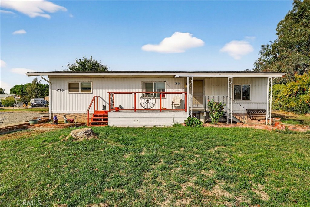 4783 County Orland, CA 95963 - Photo 2 of 73 a view of a house with backyard sitting area and garden