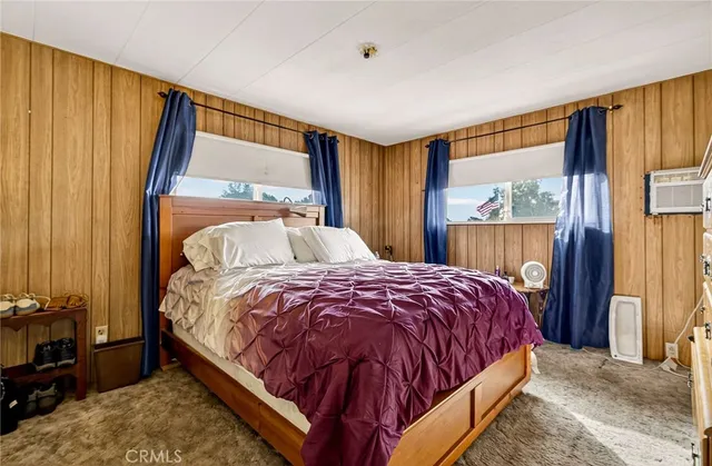 a kitchen with stainless steel appliances granite countertop a sink a stove and a microwave