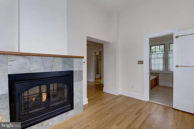 a living room with a fireplace