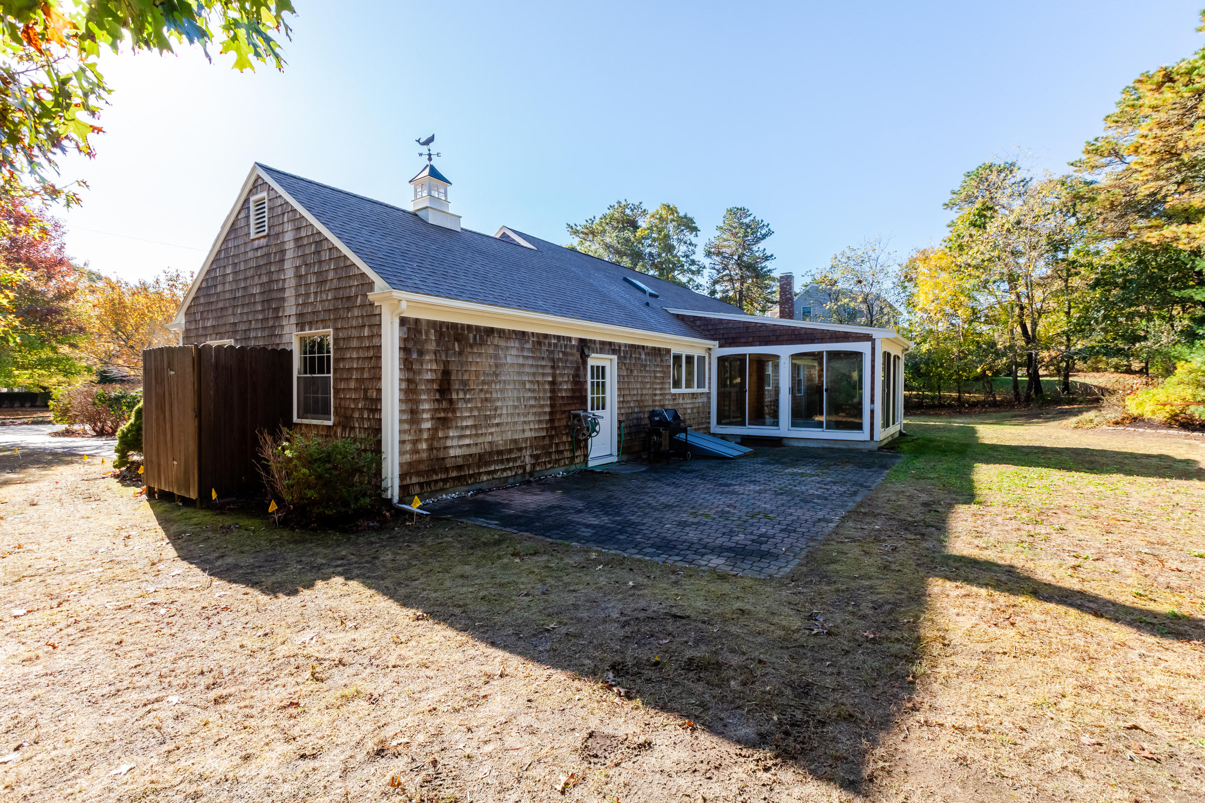 217 Round Cove Road Chatham, MA 02633 - Photo 6 of 32 a view of a house with a yard