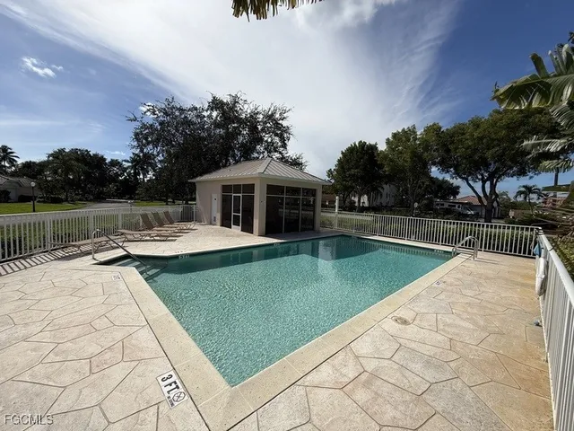 a view of a house with swimming pool