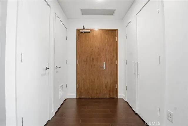 a view of bathroom with wooden floor
