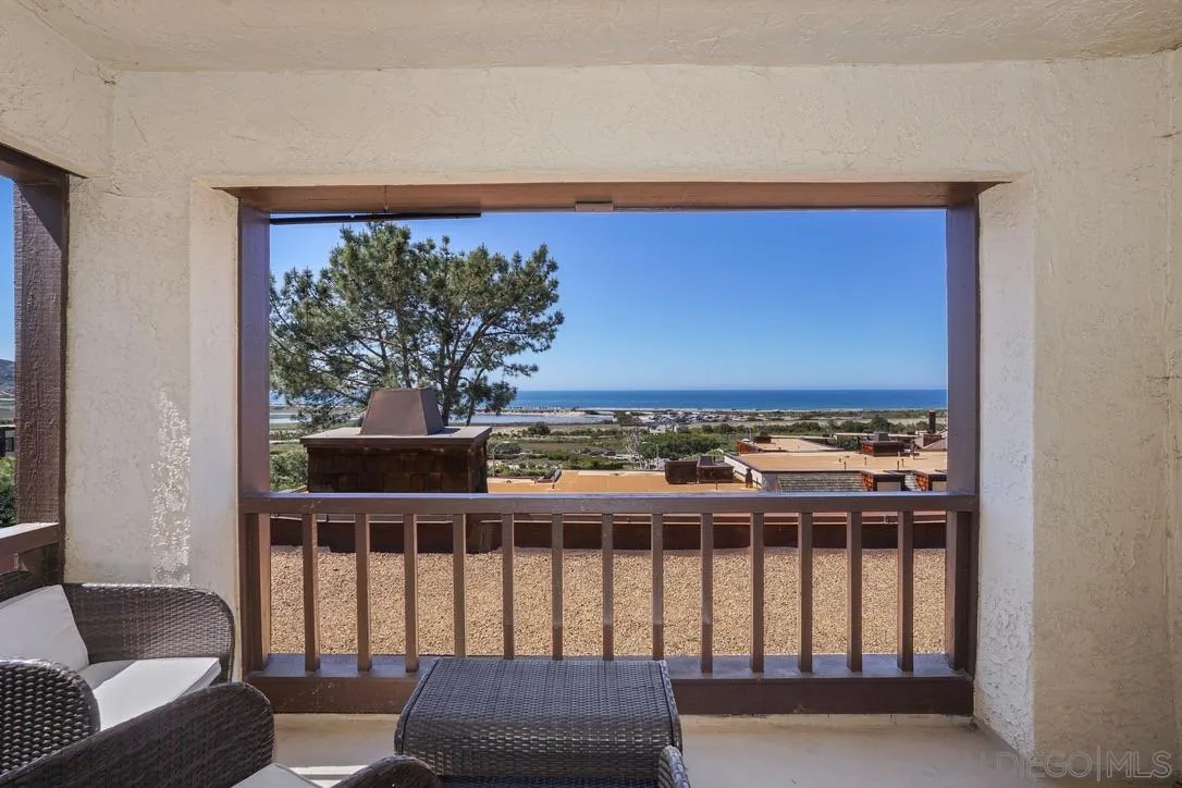 13053 Caminito Del Rocio Del Mar, CA 92014 - Photo 38 of 49 a view of a room with furniture and a floor to ceiling window