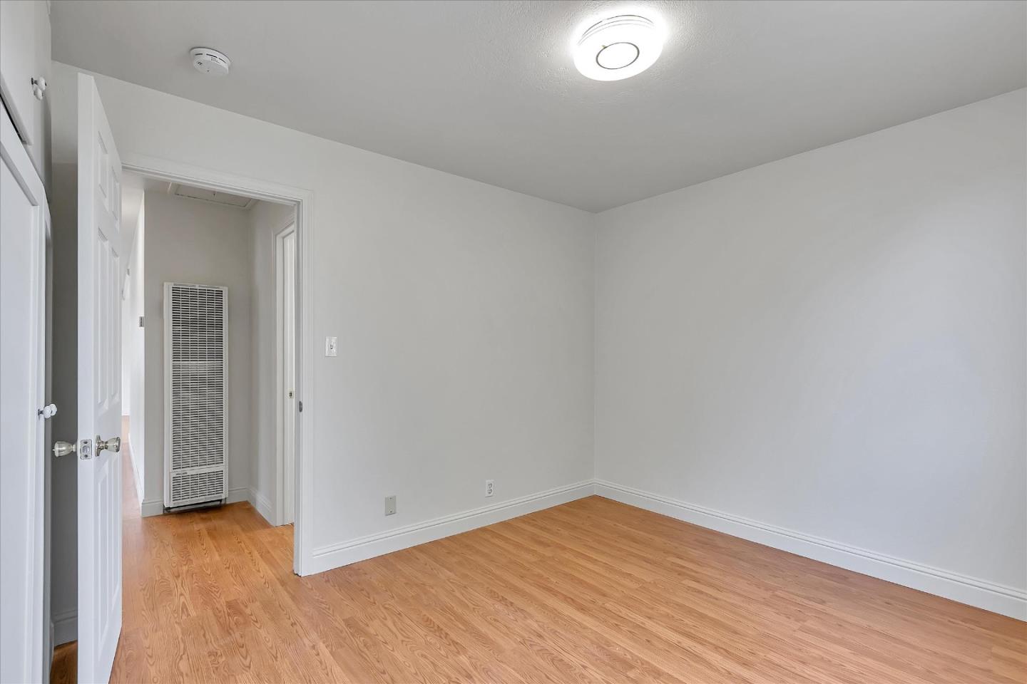 728 Arguello Boulevard Pacifica, CA 94044 - Photo 16 of 34 wooden floor in an empty room